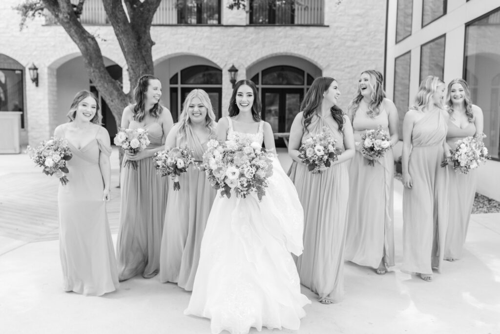 laughing bride and bridesmaids