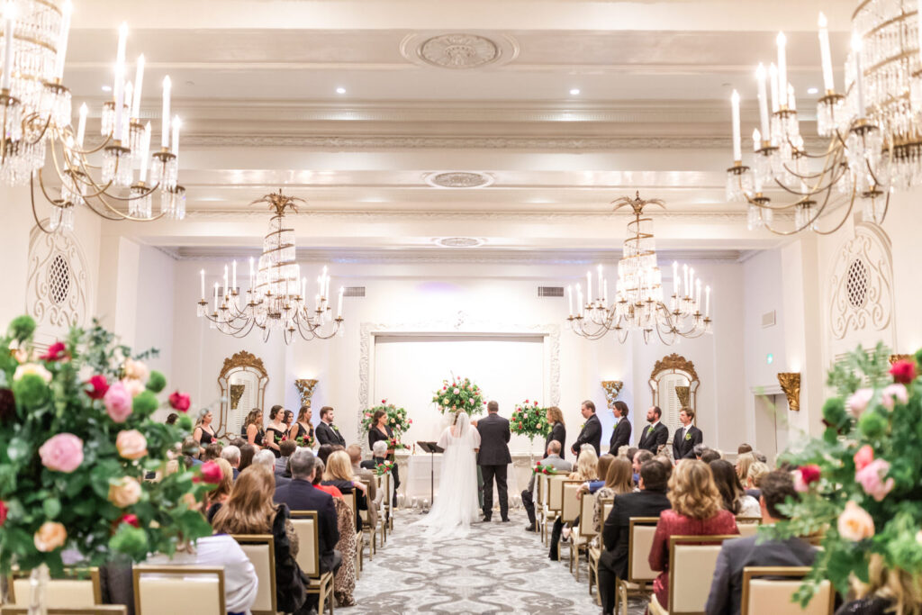 Luxury wedding ceremony in Peraux Room at St. Anthony Hotel