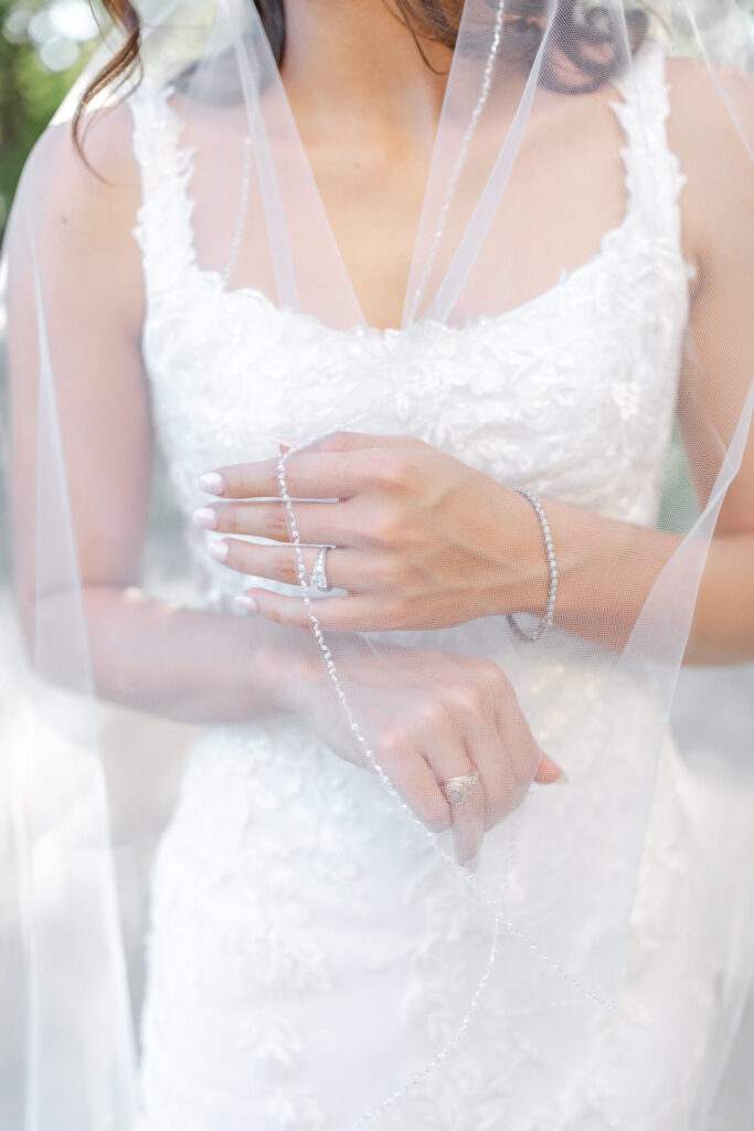 Bridal veil and engagement ring