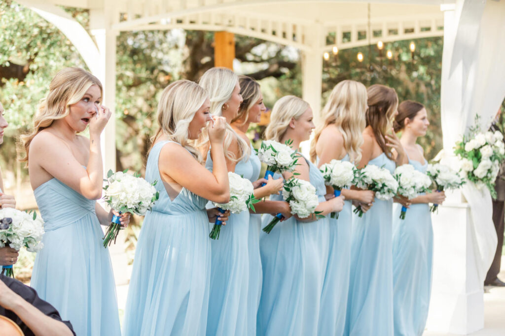 bridesmaids crying when seeing the bride