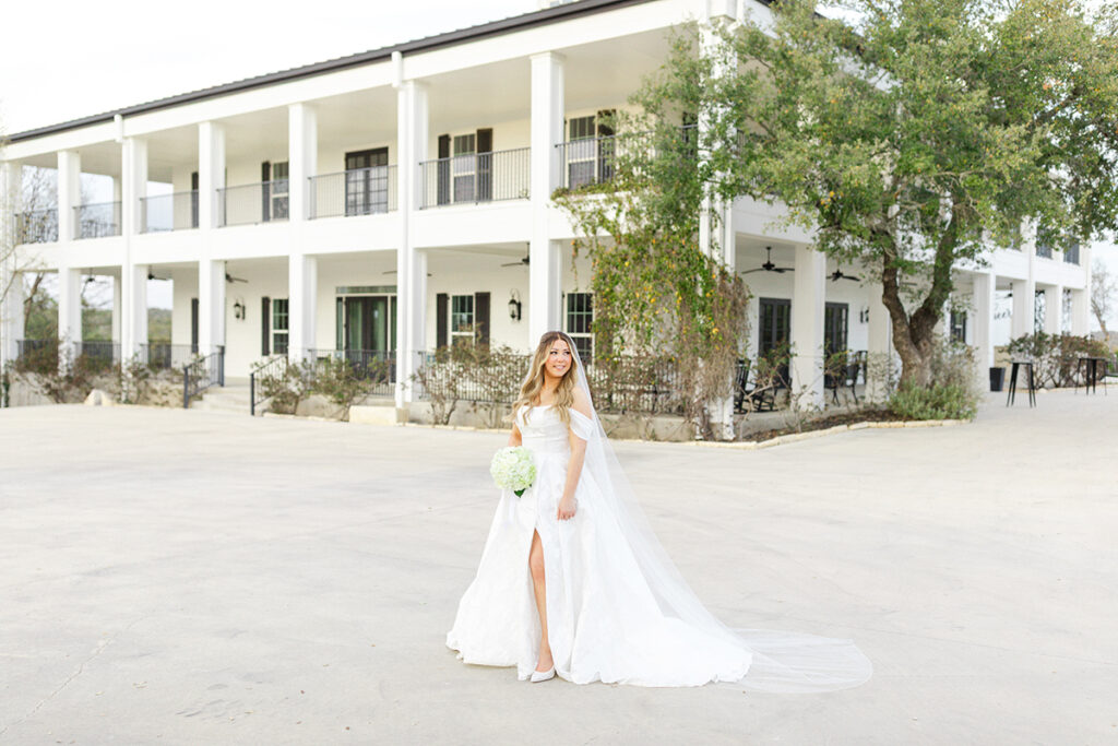 Bride in front of Kendall Point wedding venue